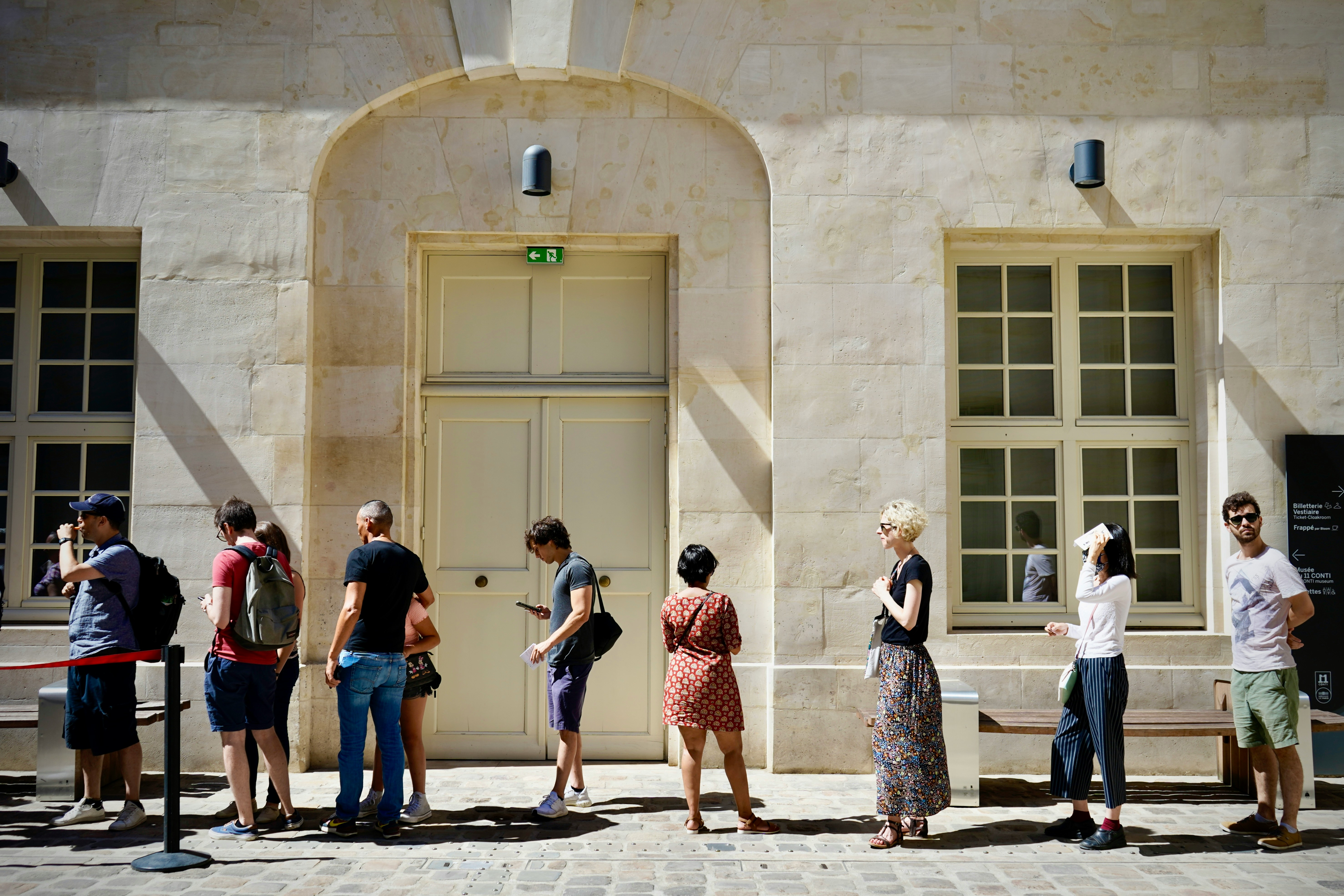 Customers waiting in a long queue